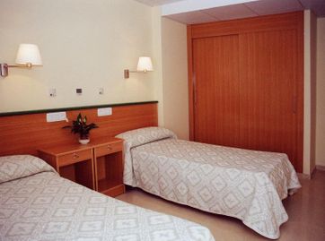 Residencial Torrefuentes habitación con dos camas